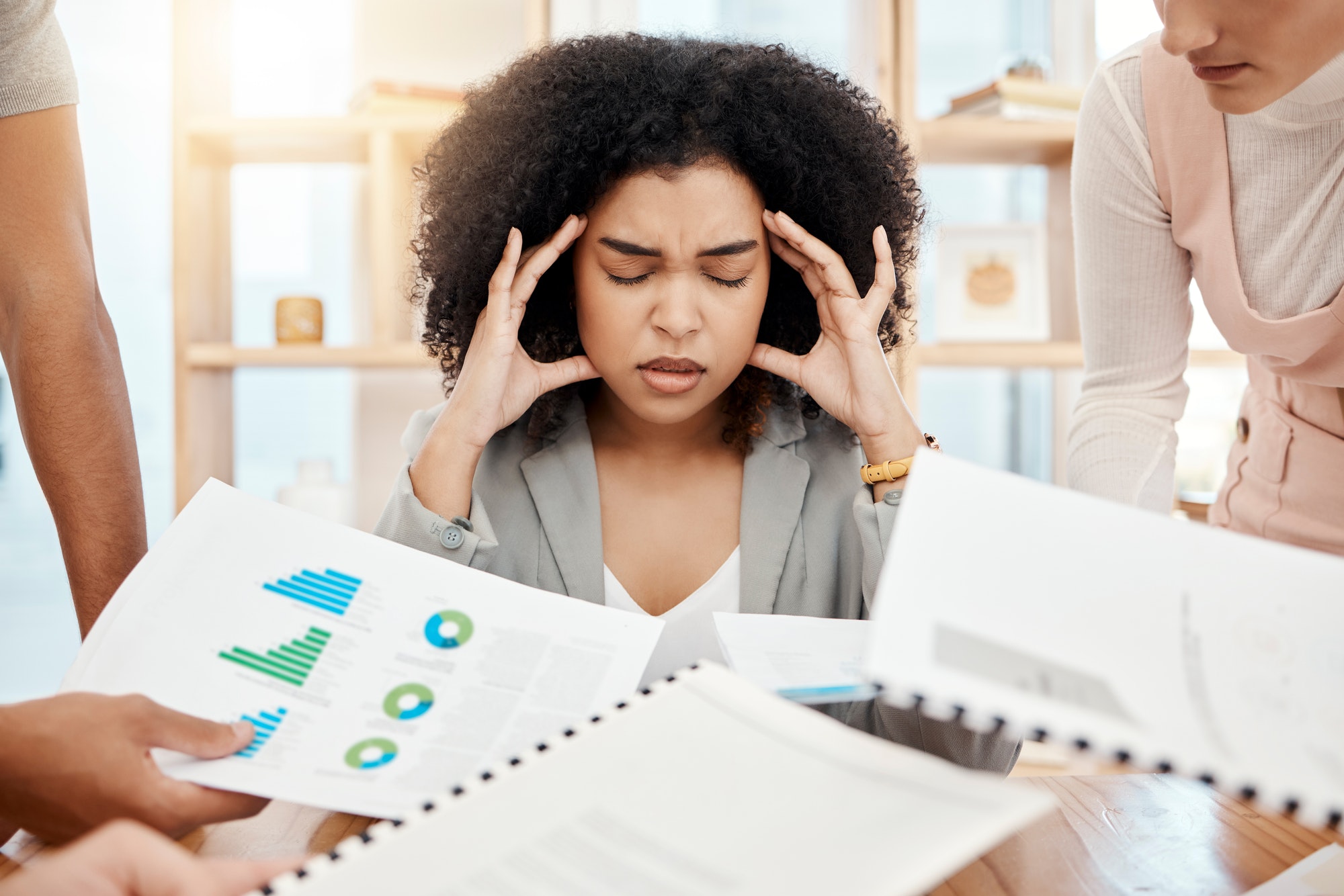 Stress, headache and burnout of business woman with busy schedule during tax compliance, report and