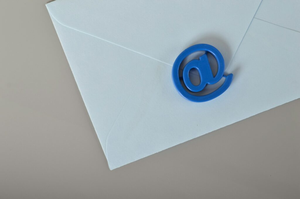 Blue envelope and email address symbol. Email marketing and email communication concept.